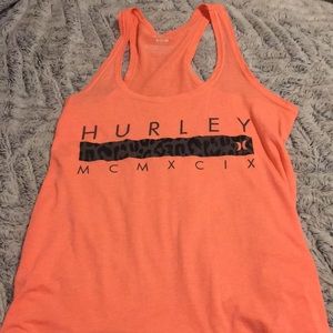 Salmon colored Hurley tank top.